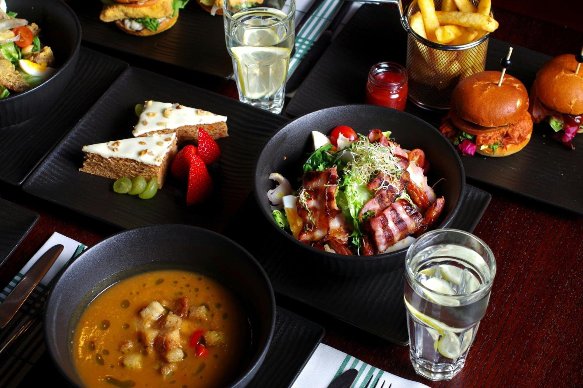 Sheraton Poznan Hotel Экстерьер фото A selection of dishes at the restaurant